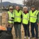 Debbie LaFrance and volunteers in yellow vests after a highway cleanup in Cottonwood, AZ