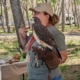 woman holding a hawk